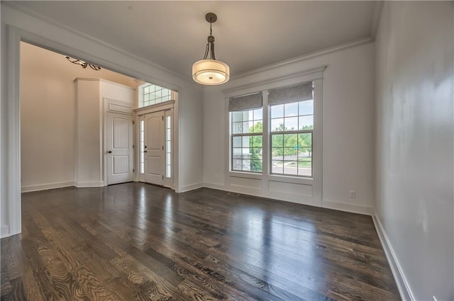 14017 Haskins St, Overland Park, KS 66221 - spare room featuring plenty of natural light, ornamental molding, and dark wood-style flooring