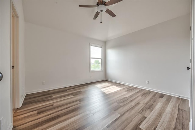 14017 Haskins St, Overland Park, KS 66221 - empty room featuring a ceiling fan, wood finished floors, and lofted ceiling