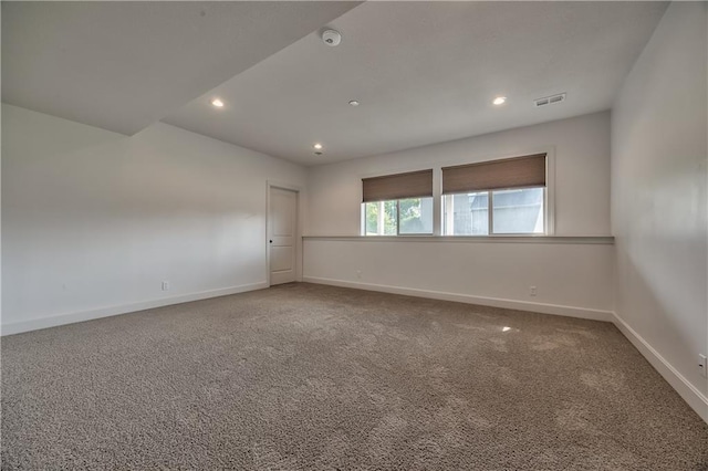 14017 Haskins St, Overland Park, KS 66221 - spare room with carpet floors, recessed lighting, and a smoke detector