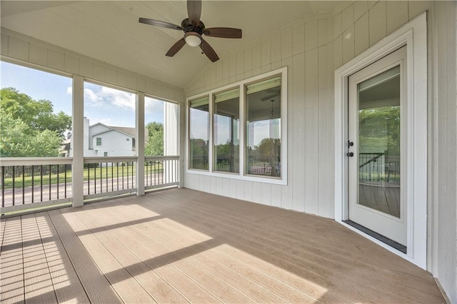 14017 Haskins St, Overland Park, KS 66221 - unfurnished sunroom with ceiling fan, lofted ceiling, and plenty of natural light