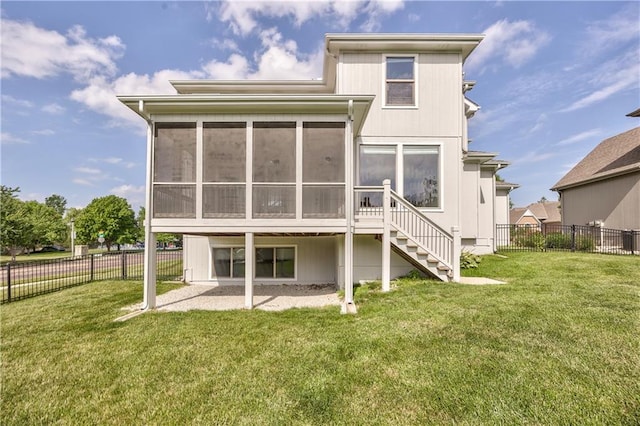 14017 Haskins St, Overland Park, KS 66221 - rear view of property with a sunroom, a fenced backyard, and stairway