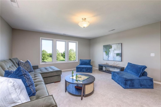 18670 W 248th St, Paola, KS 66071 - carpeted living room featuring baseboards