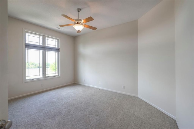 18670 W 248th St, Paola, KS 66071 - carpeted spare room with baseboards and ceiling fan