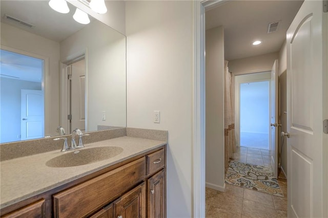 18670 W 248th St, Paola, KS 66071 - full bathroom with vanity, tile patterned flooring, and recessed lighting
