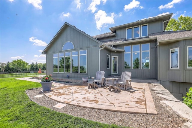 18670 W 248th St, Paola, KS 66071 - back of house featuring a patio and a shingled roof