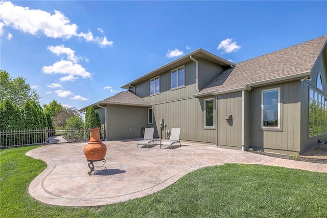 18670 W 248th St, Paola, KS 66071 - rear view of property with a patio and a shingled roof