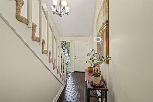 16304 W 126th St, Olathe, KS 66062 - entryway with a chandelier, stairway, and dark wood-style flooring