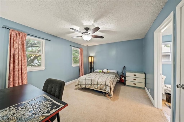 16304 W 126th St, Olathe, KS 66062 - bedroom featuring carpet, a ceiling fan, and a textured ceiling