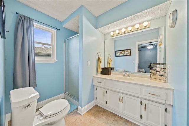 16304 W 126th St, Olathe, KS 66062 - ensuite bathroom featuring vanity, a stall shower, a ceiling fan, tile patterned flooring, and a textured ceiling
