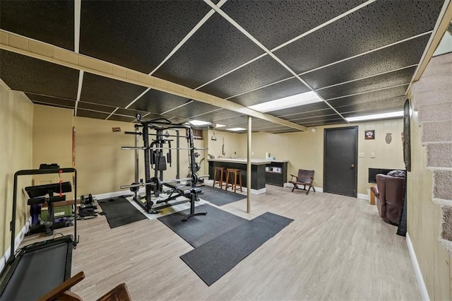 16304 W 126th St, Olathe, KS 66062 - workout area featuring wood finished floors and baseboards