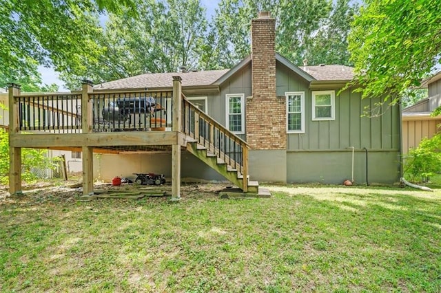 16304 W 126th St, Olathe, KS 66062 - back of property featuring a lawn, a deck, stairway, a chimney, and board and batten siding