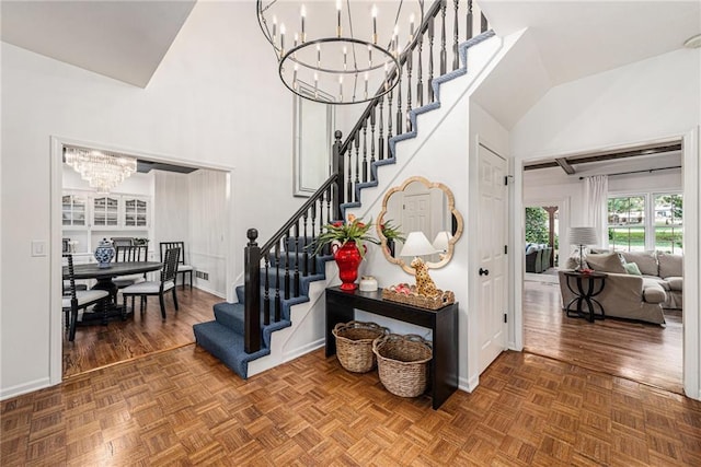 11401 Cedar St, Leawood, KS 66211 - stairs with a chandelier and high vaulted ceiling