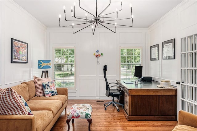 11401 Cedar St, Leawood, KS 66211 - office area featuring a decorative wall, healthy amount of natural light, light wood finished floors, crown molding, and a chandelier