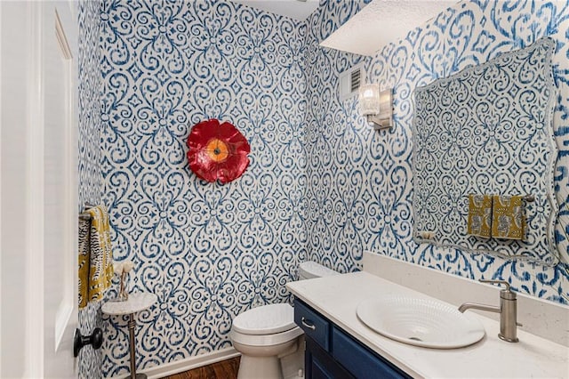 11401 Cedar St, Leawood, KS 66211 - bathroom with wallpapered walls and vanity