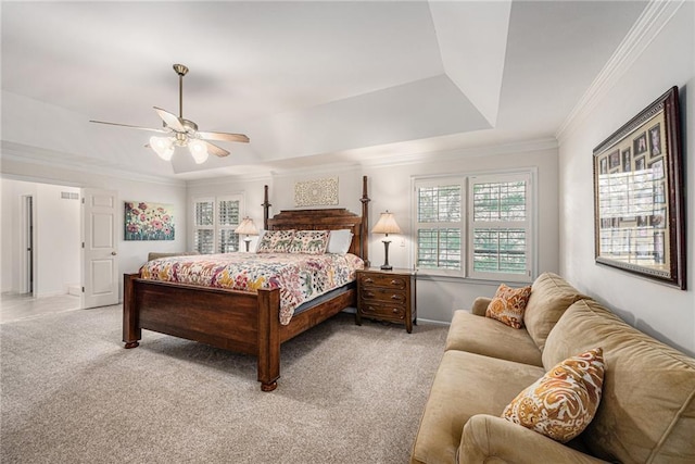 11401 Cedar St, Leawood, KS 66211 - bedroom with light colored carpet, crown molding, a tray ceiling, and ceiling fan