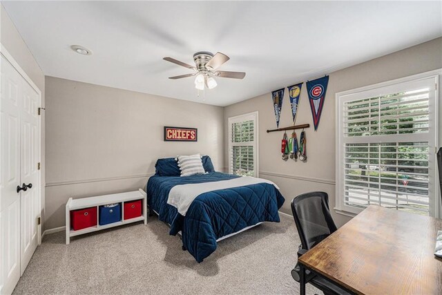 11401 Cedar St, Leawood, KS 66211 - carpeted bedroom with an office area and a ceiling fan