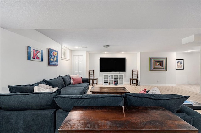 11401 Cedar St, Leawood, KS 66211 - living area with light wood finished floors and baseboards