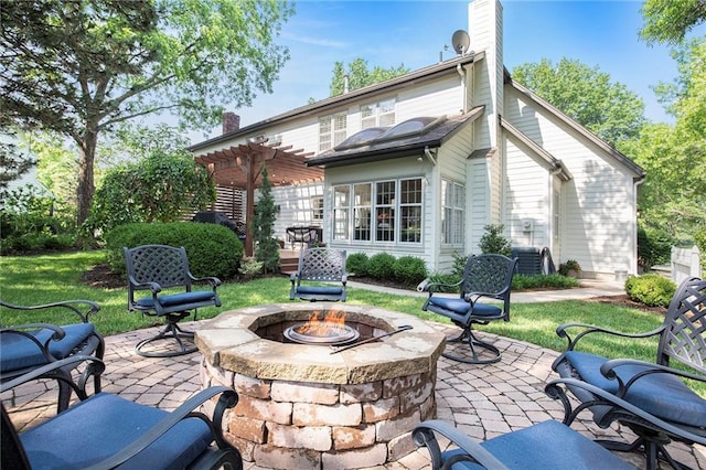 11401 Cedar St, Leawood, KS 66211 - back of house featuring a chimney, an outdoor fire pit, a pergola, and a patio