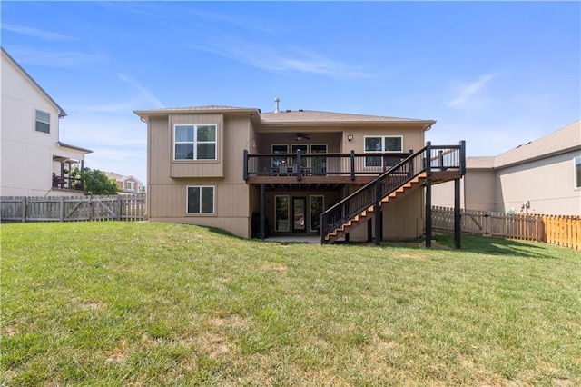 1013 SE Beatty Ct, Blue Springs, MO 64014 - back of house featuring stairway, a deck, a ceiling fan, and a fenced backyard