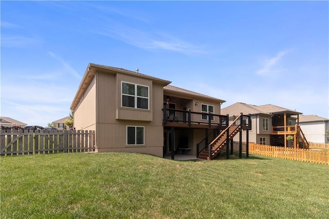 1013 SE Beatty Ct, Blue Springs, MO 64014 - back of house featuring stairs, a fenced backyard, and a deck