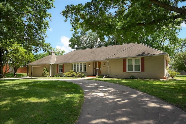 4411 W 89th St, Prairie Village, KS 66207 - ranch-style house featuring a front yard, a garage, driveway, and a chimney