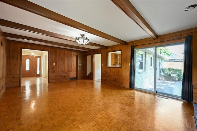 4411 W 89th St, Prairie Village, KS 66207 - empty room featuring wooden walls and beam ceiling