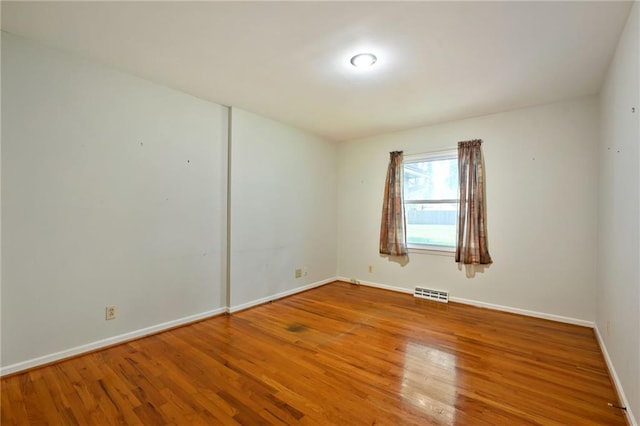 4411 W 89th St, Prairie Village, KS 66207 - empty room with wood finished floors and baseboards