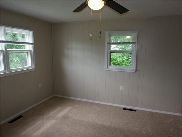 715 N Warren St, Warrensburg, MO 64093 - carpeted empty room featuring ceiling fan