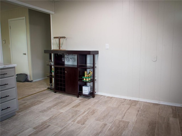 715 N Warren St, Warrensburg, MO 64093 - detailed view of wood tiled floors and a bar