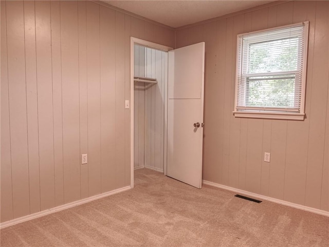 715 N Warren St, Warrensburg, MO 64093 - unfurnished bedroom featuring carpet