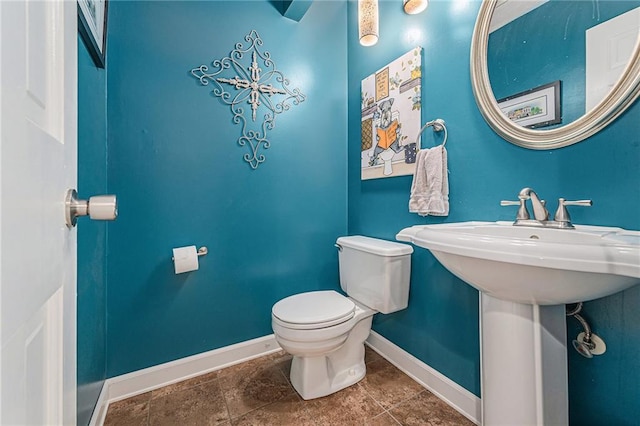 807 NW Bent Tree Dr, Lees Summit, MO 64081 - half bathroom with baseboards and toilet