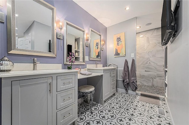 807 NW Bent Tree Dr, Lees Summit, MO 64081 - bathroom featuring a walk in shower, vanity, and tile patterned flooring
