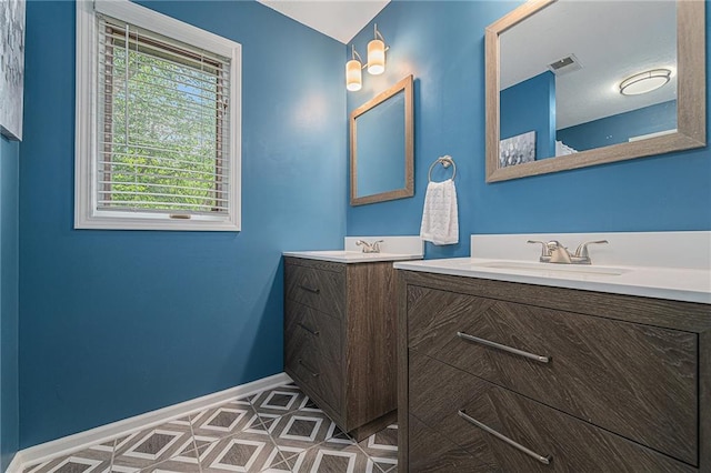 807 NW Bent Tree Dr, Lees Summit, MO 64081 - full bath with two vanities and baseboards