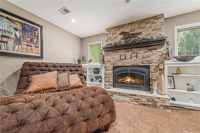 807 NW Bent Tree Dr, Lees Summit, MO 64081 - living room with a stone fireplace and plenty of natural light
