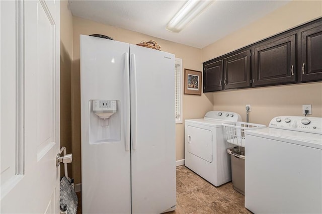 807 NW Bent Tree Dr, Lees Summit, MO 64081 - laundry room featuring independent washer and dryer and cabinet space