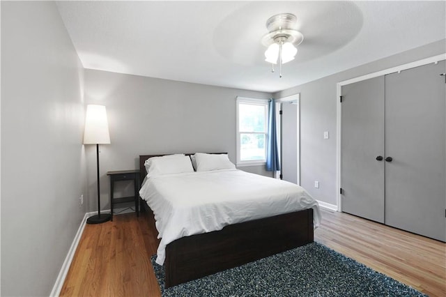 809 E 110th St, Kansas City, MO 64131 - bedroom featuring wood finished floors and ceiling fan