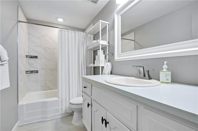 809 E 110th St, Kansas City, MO 64131 - full bath with vanity, shower / tub combo, and wood finished floors