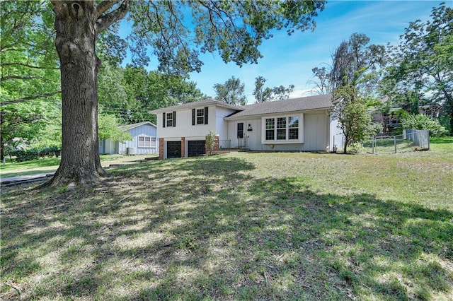 809 E 110th St, Kansas City, MO 64131 - split level home with an attached garage