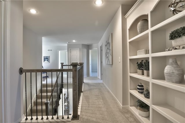 2749 W Dartmouth St, Olathe, KS 66061 - hall with carpet, an upstairs landing, recessed lighting, and built in shelves