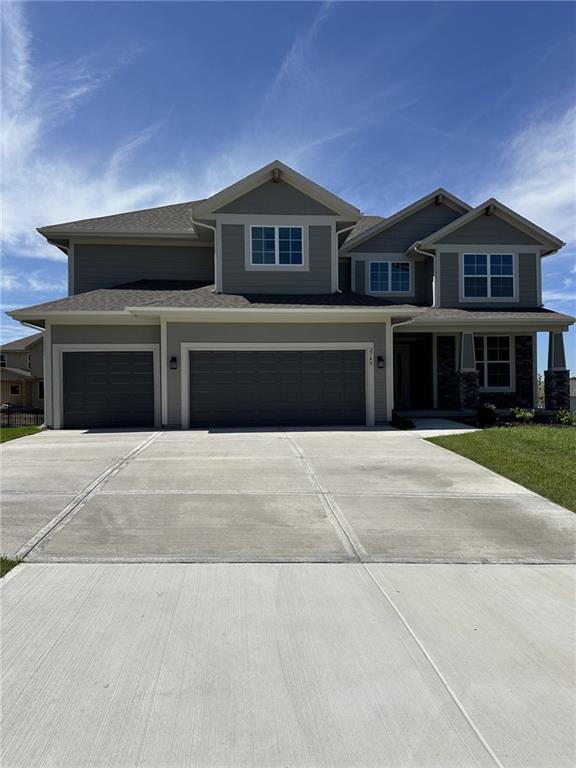 2749 W Dartmouth St, Olathe, KS 66061 - view of front of property with driveway and an attached garage