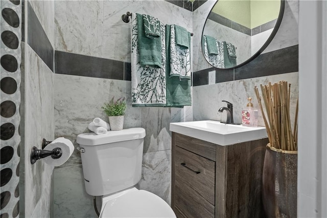 3230 Bellefontaine Ave, Kansas City, MO 64128 - bathroom with vanity and tile walls