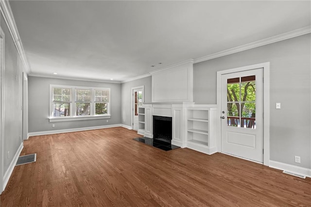 1535 W 75th St, Kansas City, MO 64114 - unfurnished living room with ornamental molding, wood finished floors, and a fireplace