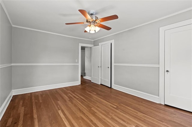 1535 W 75th St, Kansas City, MO 64114 - unfurnished bedroom featuring wood finished floors, a closet, ceiling fan, and crown molding