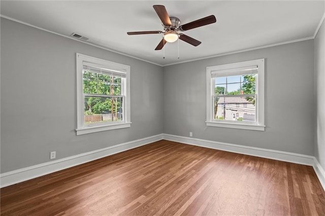 1535 W 75th St, Kansas City, MO 64114 - unfurnished room featuring crown molding, wood finished floors, and a ceiling fan
