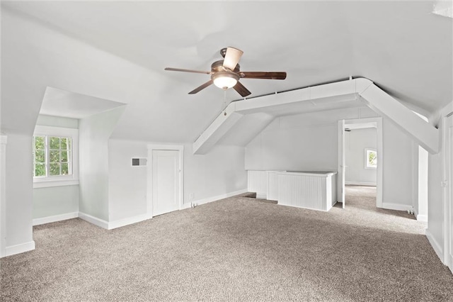 1535 W 75th St, Kansas City, MO 64114 - additional living space featuring light carpet, healthy amount of natural light, lofted ceiling, and ceiling fan