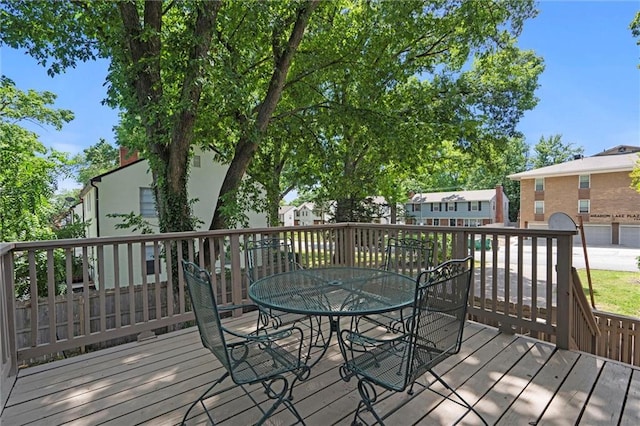 1535 W 75th St, Kansas City, MO 64114 - deck with outdoor dining space and a residential view