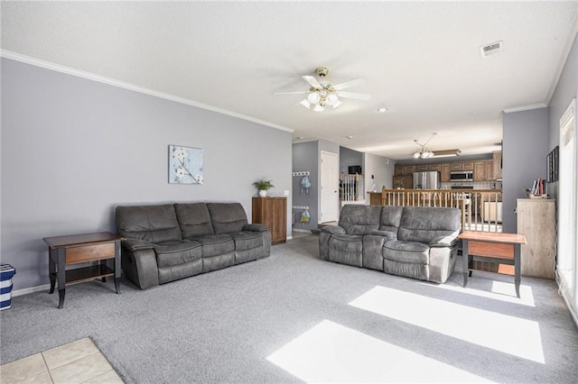 2417 SW Woodhaven Ln, Lees Summit, MO 64082 - living area featuring a ceiling fan, ornamental molding, light colored carpet, and light tile patterned flooring