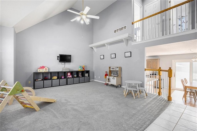 2417 SW Woodhaven Ln, Lees Summit, MO 64082 - game room featuring a ceiling fan, high vaulted ceiling, and carpet