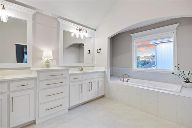 20487 W 108th St, Olathe, KS 66061 - bathroom with double vanity, a bath, and tile patterned flooring