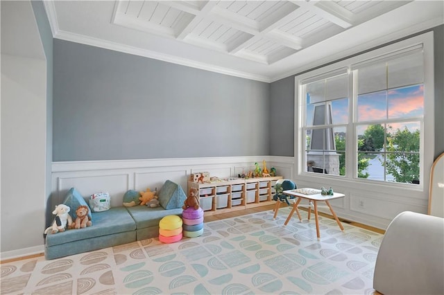 20487 W 108th St, Olathe, KS 66061 - rec room featuring beamed ceiling, coffered ceiling, wood finished floors, a wainscoted wall, and ornamental molding